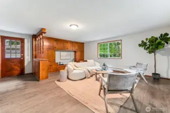 large family room with custom built-in adds more space to spead out, relax and entertain.