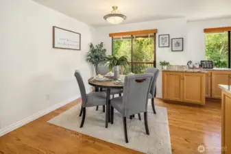 dining space leads to private upper deck and well appointed kitchen