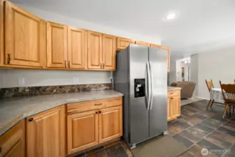 Another view of the kitchen and dining room.