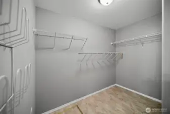 Walk-in closet in the primary bedroom.