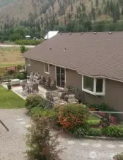 Back patio and back fenced in area.