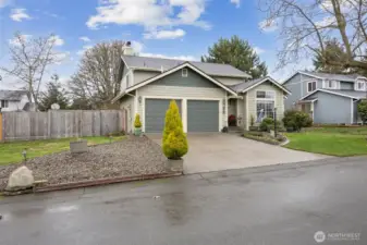 Possible RV parking to left of garage with minor landscape and fence modification.
