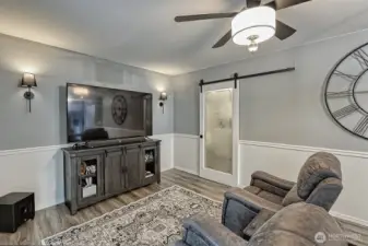 Barn door to spacious laundry room