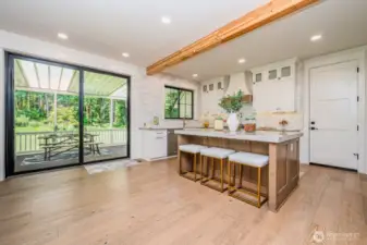 The kitchen flows beautifully into dining and living (great room) areas for effortless entertaining!
