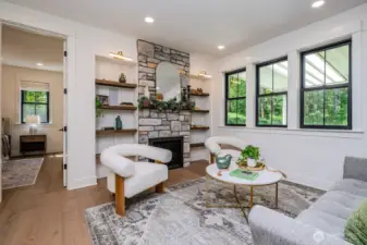 Love the built-ins on either side of the fireplace. A built-in TV mount and outlet are built into the stone above the mantel allowing you to easily conceal cords.