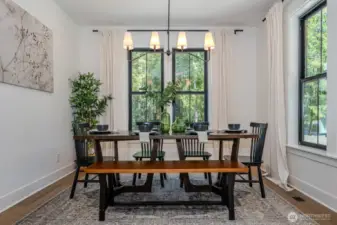 Turn your dining table AND light fixture to a vertical position to fit a longer table as needed. Such a lovely option to accommodate a larger group!