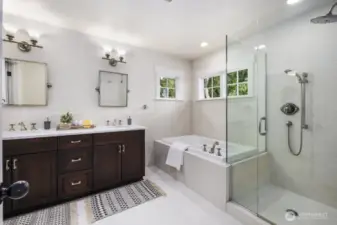 Primary ensuite full bathroom with Restoration Hardware fixtures.  Tiled floors have radiant heat.