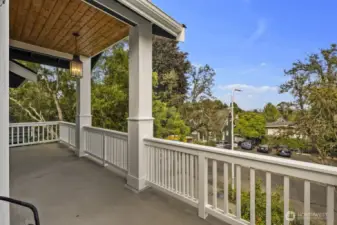 Large partially covered primary bedroom balcony/porch.