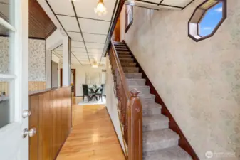 Upon entry, you’re greeted by the staircase to the right and a welcoming living room to the left, with the dining area just down the hall.