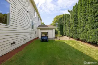 Drive from your home right on to the 11th Tee. Plenty of space for you to add a separate golf cart garage! Here is a rendering of adding a door to the garage. Other idea is to add on.