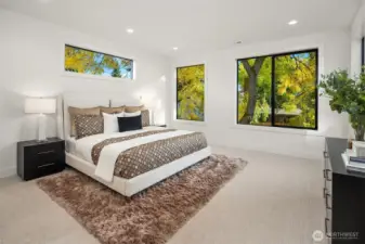 Designer primary suite with five-piece bath with heated floors