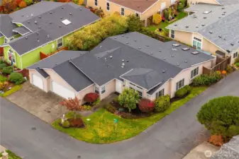 Aerial view showing the lot. 3-car garage has lots of storage cabinets.