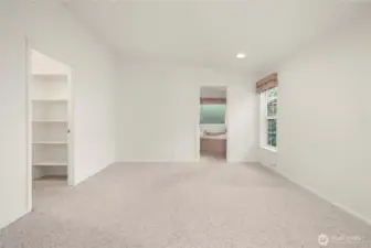 Primary suite is spacious and comes with a walk-in-closet and 5-piece bath.