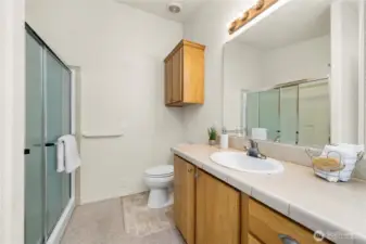 Full-size shower in the Primary Bath and 2nd vanity.
