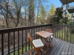 Secluded, tree-lined patio offering a peaceful and private outdoor retreat.
