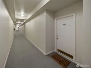 Another view of the front door from the secure interior hallway.