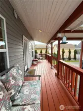 covered porch between garage and home
