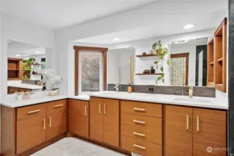 Taller cabinets to ease your back discomfort. These Mahogany cabinetry is gorgeous!