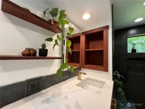 Open shelves and lovely wall storage. Quartz countertops.
