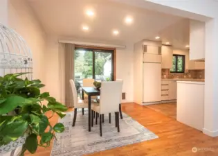 Bright Dining Area Leads to deck overlooking backyard. Easy access for BBQ Season!