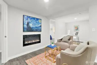 Downstairs living area w/electric fireplace