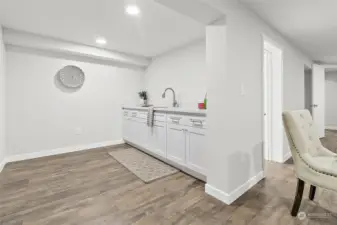 Downstairs wet bar could easily be convereted to full kitchen