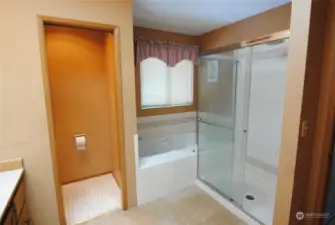 Soaking tub and shower with twin sinks in master bath