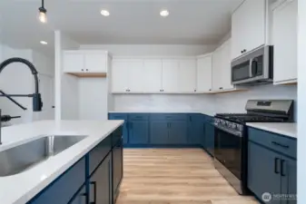 Kitchen - Pics are of a different 2834 plan. Features and colors may differ.