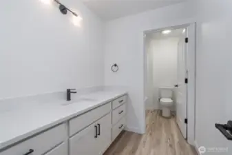 Upstairs Guest Bathroom - Pics are of a different 2834 plan. Features and colors may differ.