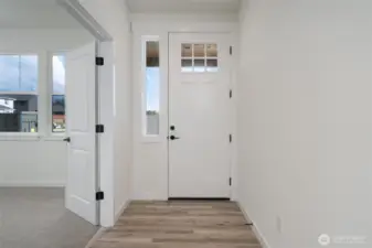 Main level entrance -Pics are of a different 2834 plan. Features and colors may differ.