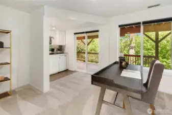 Office with coffee nook and access to lower level back deck.