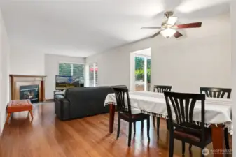 Dining area with chandelier and fan