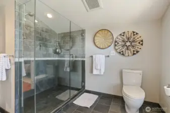 Completely updated with a spacious walk-in shower and heated floors.