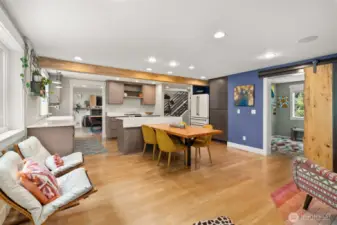 Oversized kitchen features single slab old growth table
