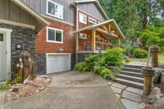 Stylish PNW exterior w/ mixed use of wood and stone.