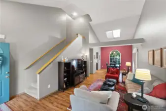 Large open inviting living room. Seller's really appreciate the vaulted ceilings in this area of the house.