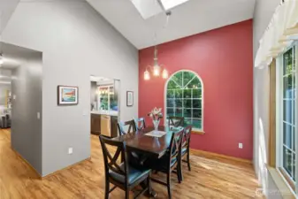 Dining room is large enough for your big table and a crowd around it.