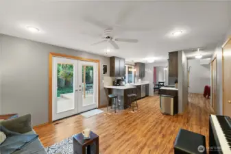 French doors lead to the backyard.