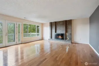 Nice size Livingroom with acces to the deck with views of Dyes Inlet and Cascade Mountains.