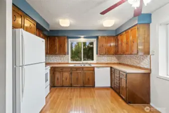 Kitchen with Hard wood floors and views of Dyes Inlet