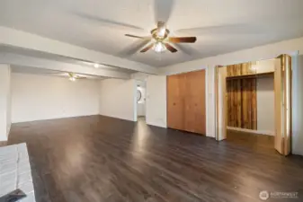 The Great Room on the lower level has a large walk in closet, and a full bath right off of the hallway door.