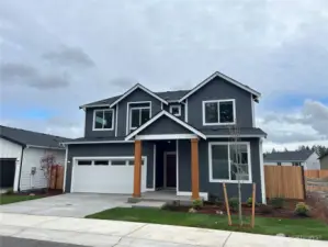 Photos are a representation of the home. Garage not yet painted- Will be same as body.