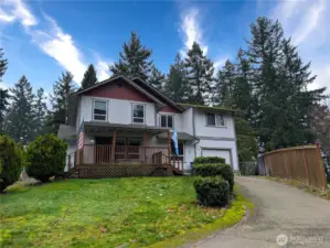 Nice cul-de-sac location with almost 1/4 acre lot & RV + boat parking (not pictured but to the left). Hard to find 5 bedroom home w/optional 6th bedroom!  Deep garage bay for 1+ cars or shop/storage & driveway parking in addition to the RV parking.  Covered entry & deck.