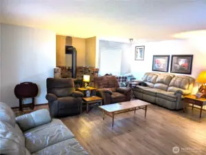 Another angle of the family room w/ample seating.