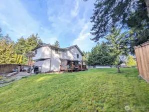 Storage & sport court to the left.  Nice covered deck.