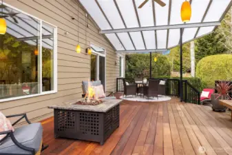 The covered outdoor space features a convenient gas connectio for your BBQ grill.