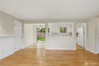 Open flow from living area to kitchen and dining with easy access to the patio and backyard.