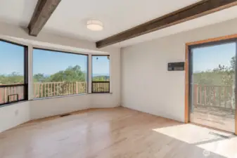 Living room with view and access to view deck