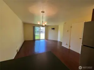 Overview of the dining room open to the living room.