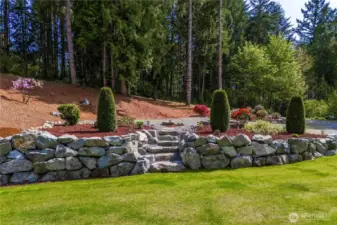 Stairway transition from parking area to yard.